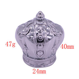 Diseño del top de la botella de perfume de la aleación del cinc de las cápsulas de perfume de la corona para de gama alta