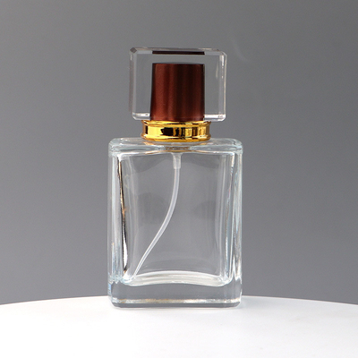 Botella separada de la muestra de los cosméticos de la botella de perfume del cuadrado del punto de la botella de la cubierta del espray del viaje de acrílico de cristal transparente de la prensa