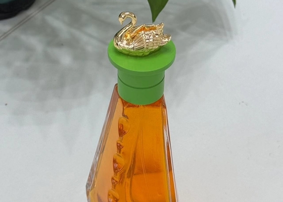 comprar Capas de perfume Zamak en forma de cisne de colores Capas de botellas de perfume de metal de lujo online manufacture