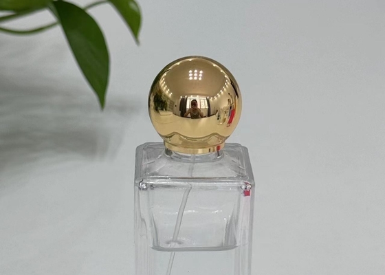 comprar Capa de perfume de metal de forma circular de aleación de zinc Zamak Botellas de perfume de vidrio online manufacture