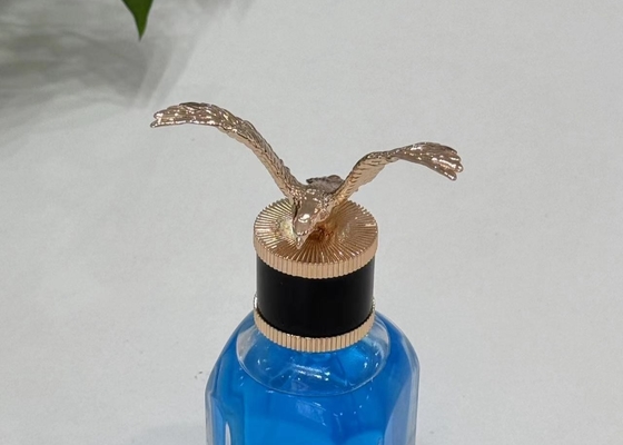 Lujosas tapas de perfume Zamak en forma de águila de aleación de zinc tapas de botellas de perfume