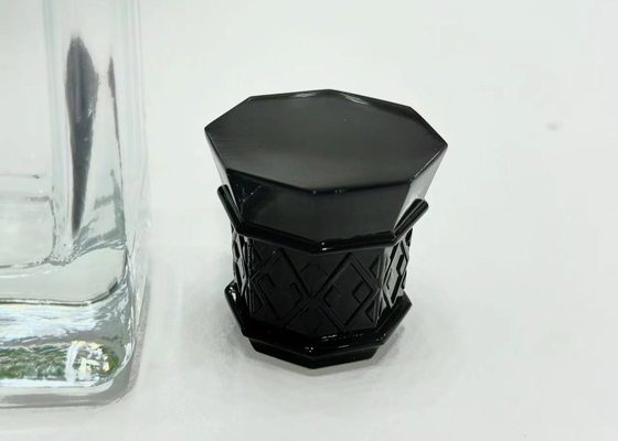 Superficies brillantes de gama alta Caps de botellas de perfume negro Capa de botellas de perfume personalizado
